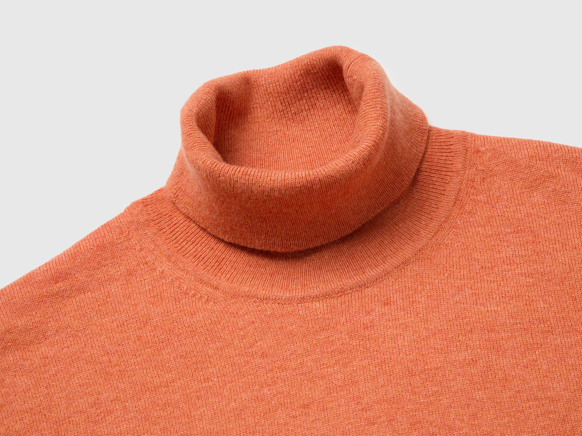 Dolcevita arancione in pura lana Merino