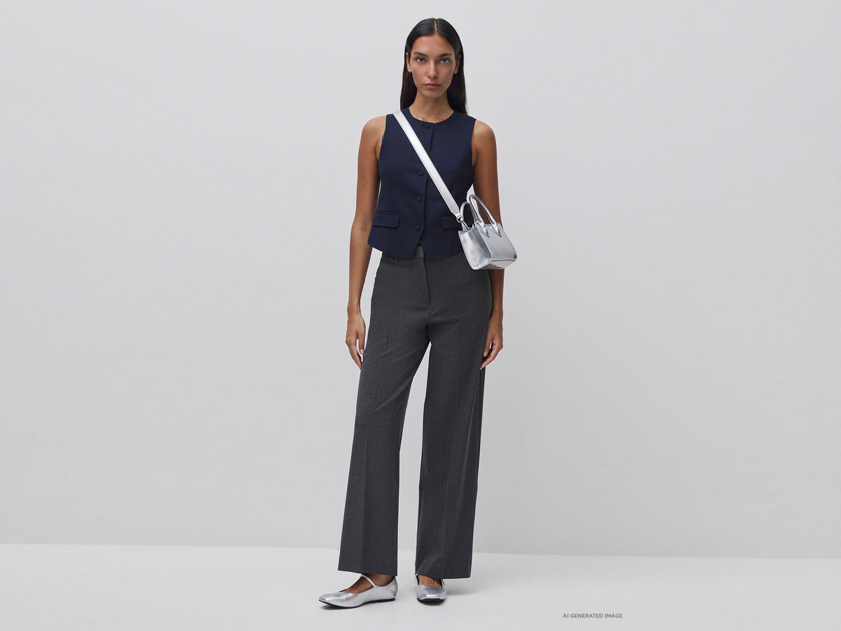 Gilet girocollo con bottoni