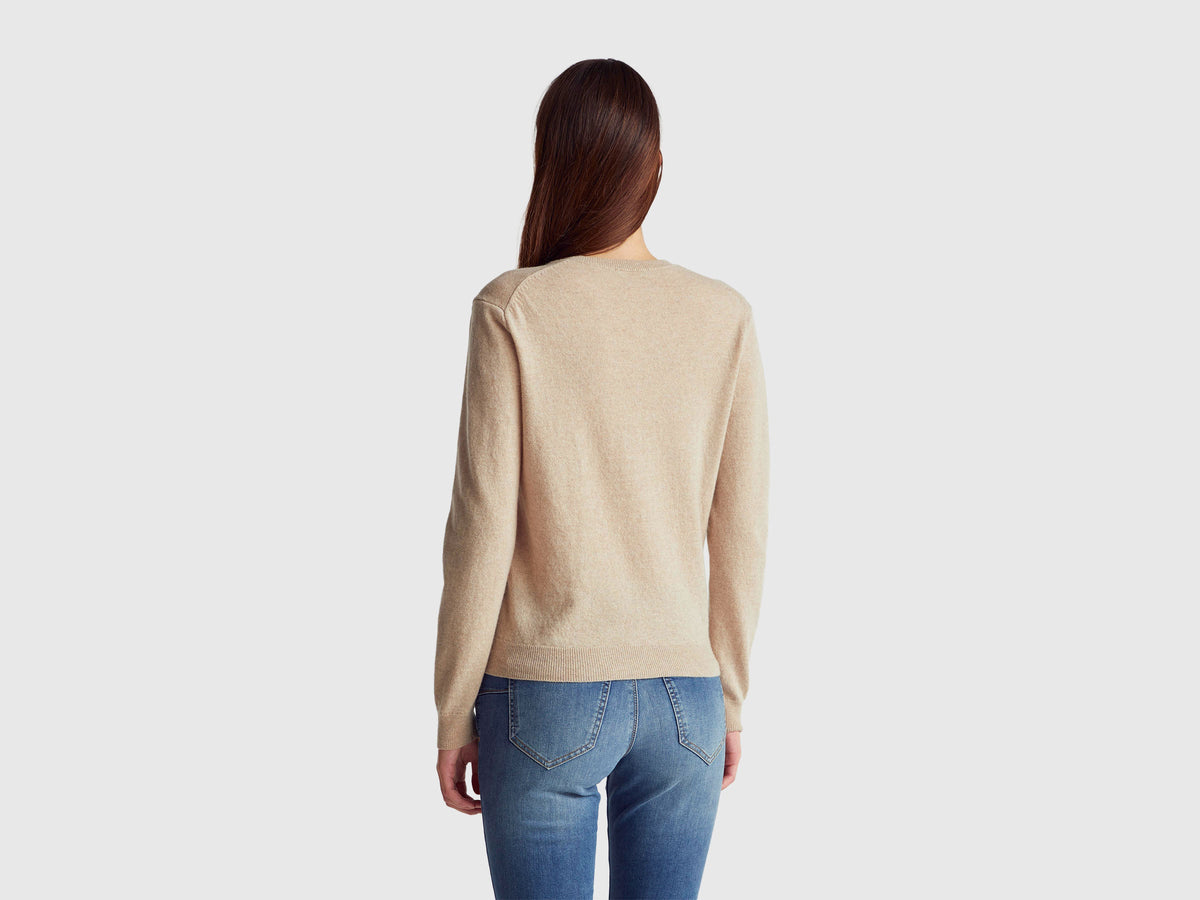 Maglia girocollo beige in pura lana Merino