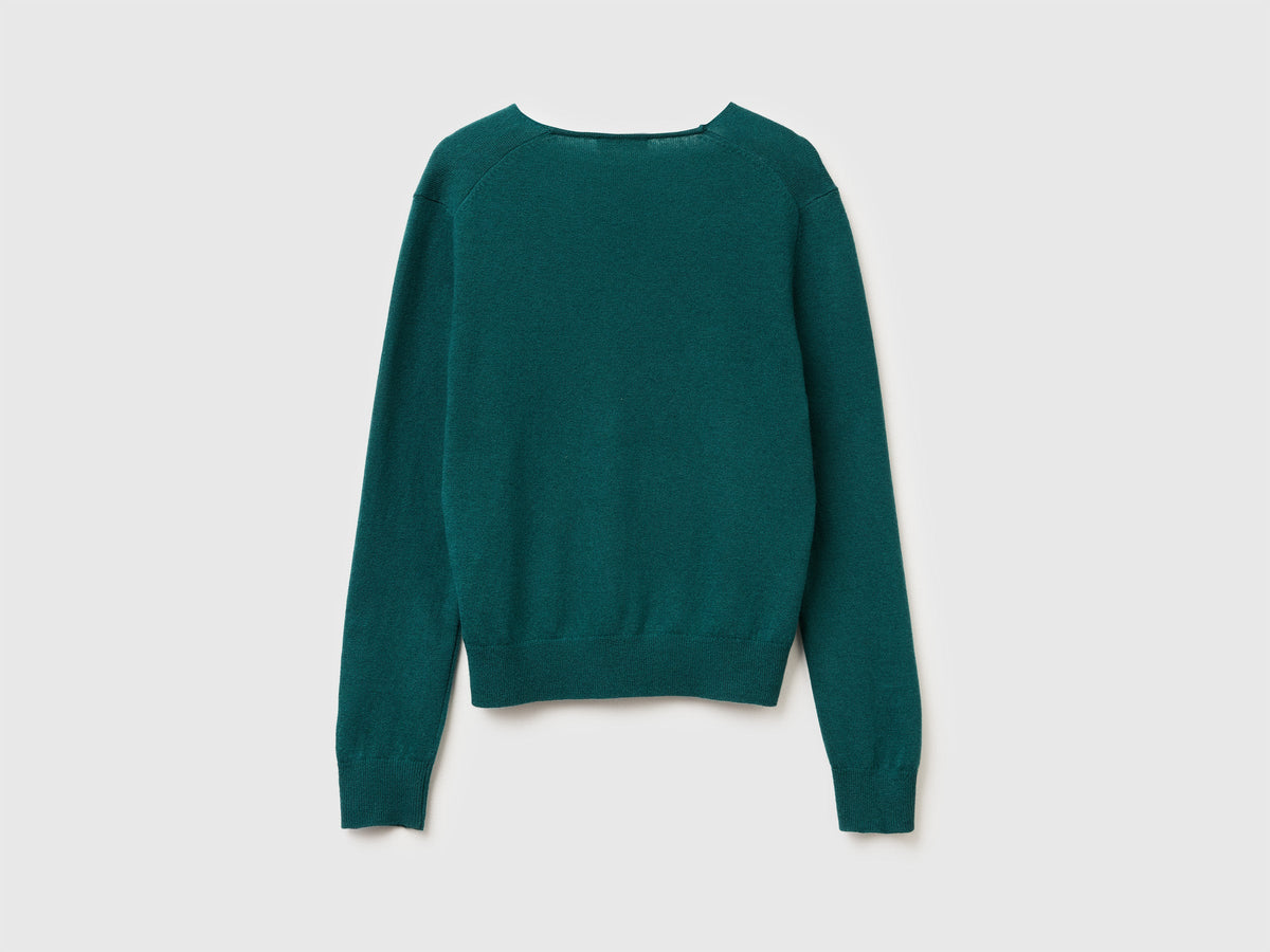 Maglione verde con scollo a V in pura lana Merino