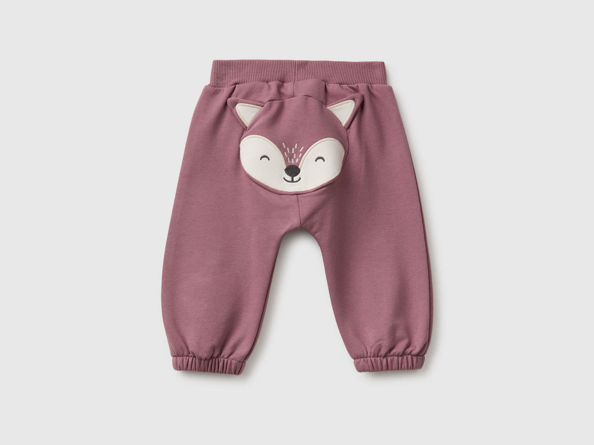 Pantaloni in felpa con animaletto sul retro