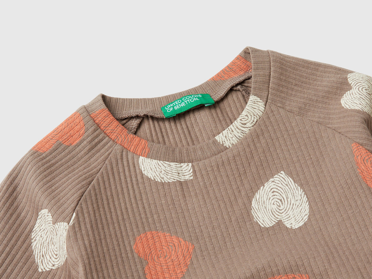 Vestito con stampa e bottoni