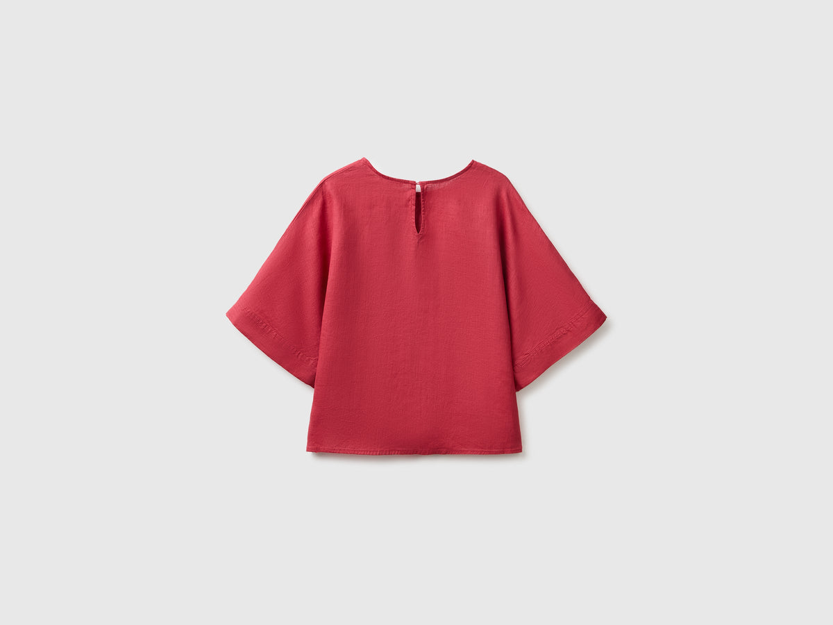 Blusa girocollo in puro lino
