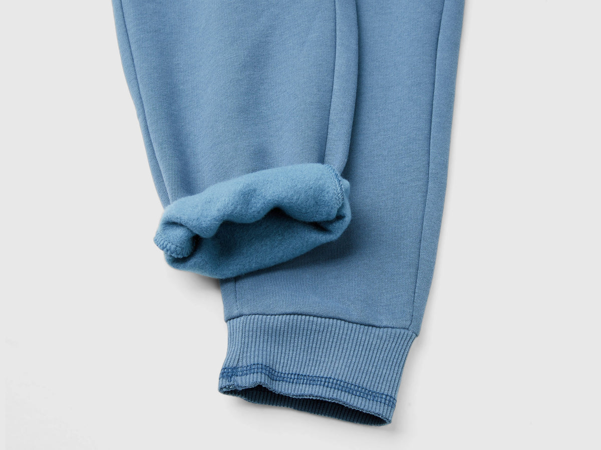 Pantaloni in calda felpa con stampa