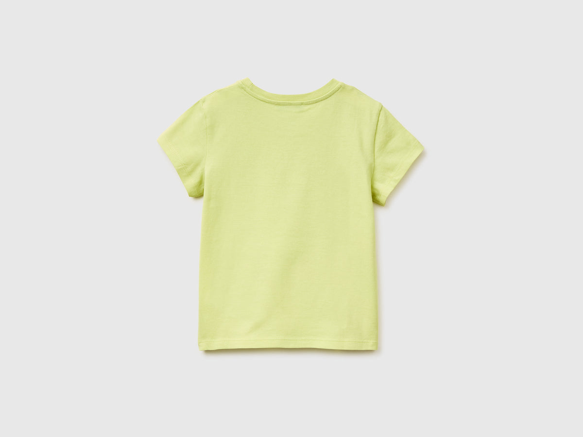 T-shirt con stampa glitter