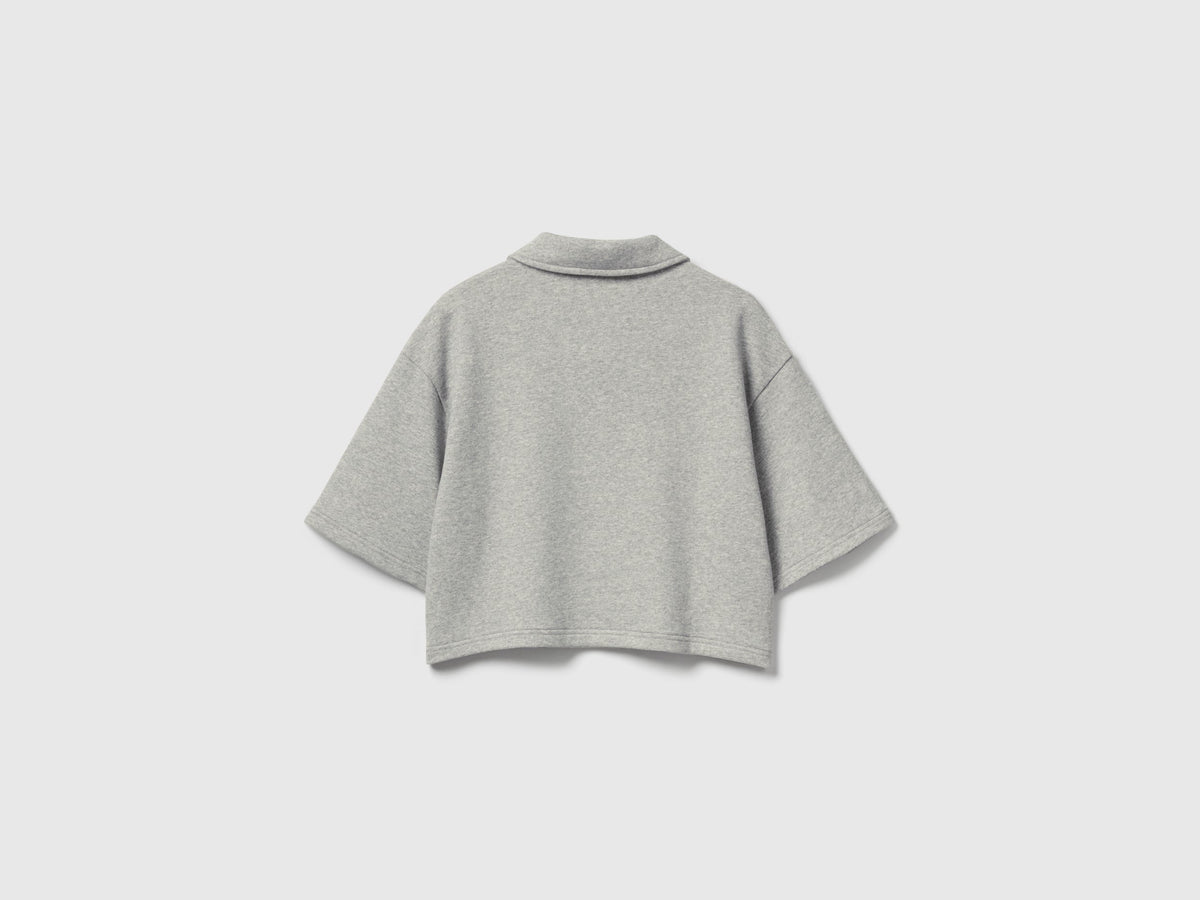 Polo cropped con zip Stranger Things