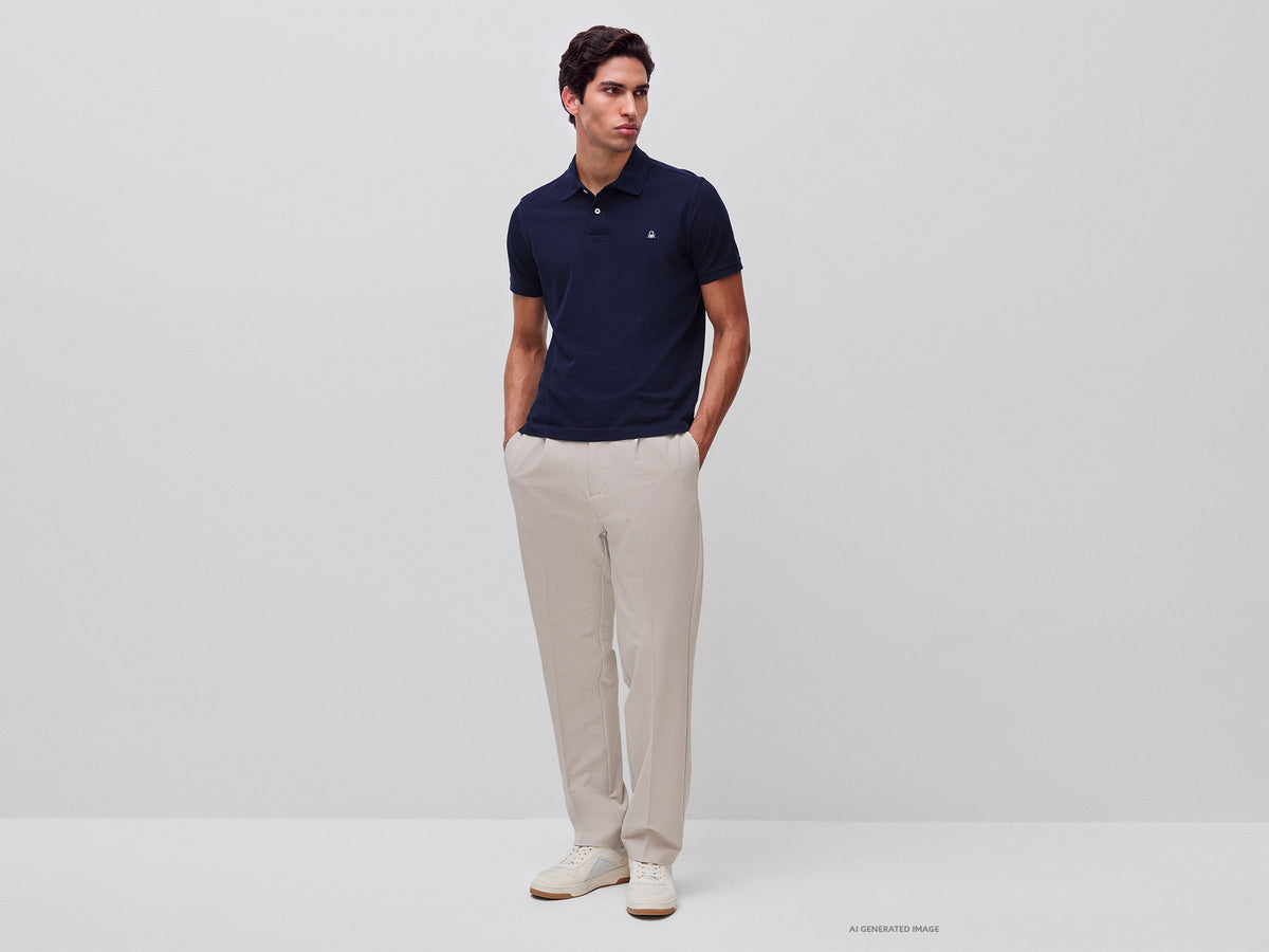 Pantaloni con pinces e piega