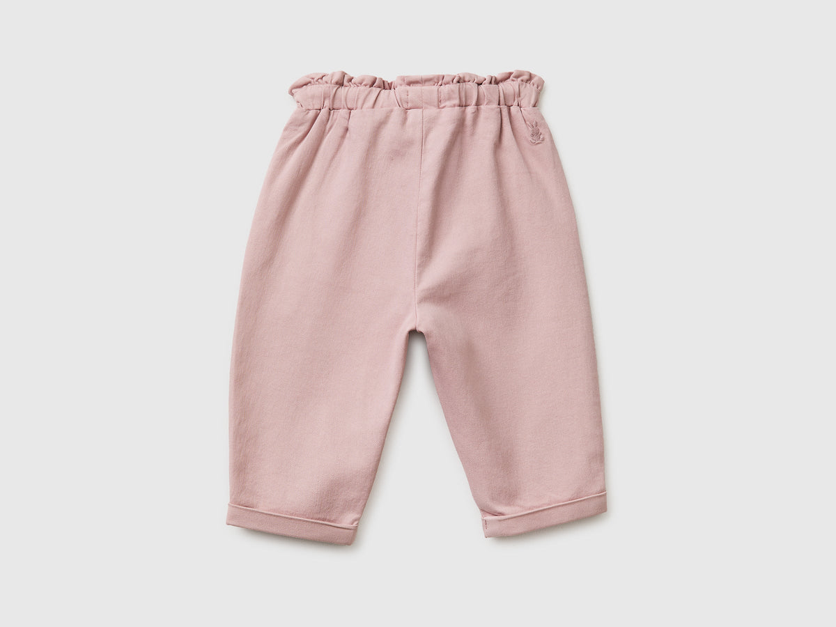 Pantaloni con mini rouches