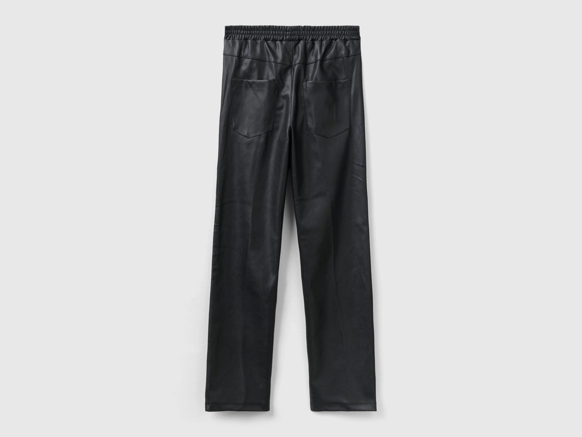 Pantaloni slim fit in tessuto spalmato