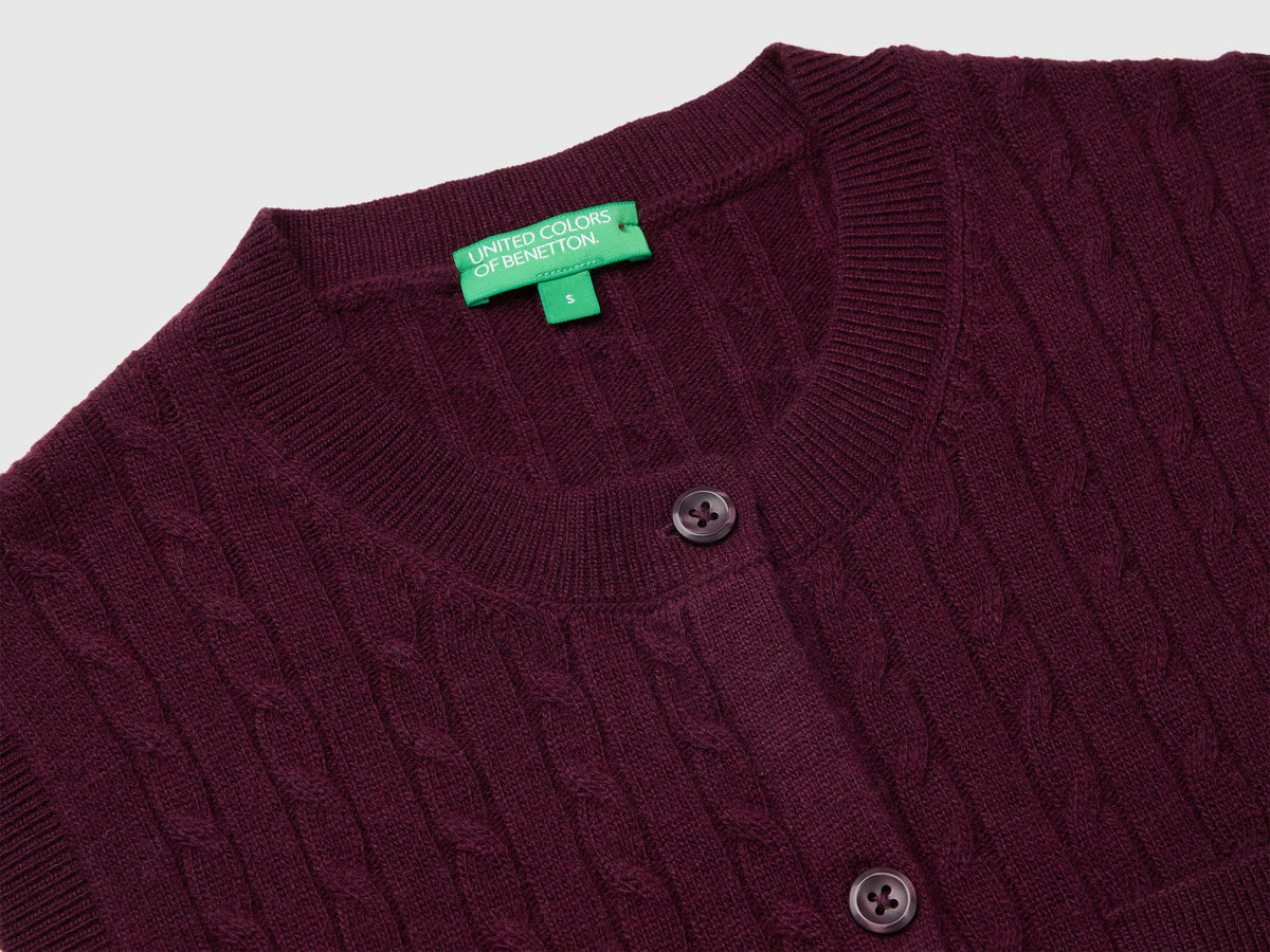 Gilet in maglia con trecce