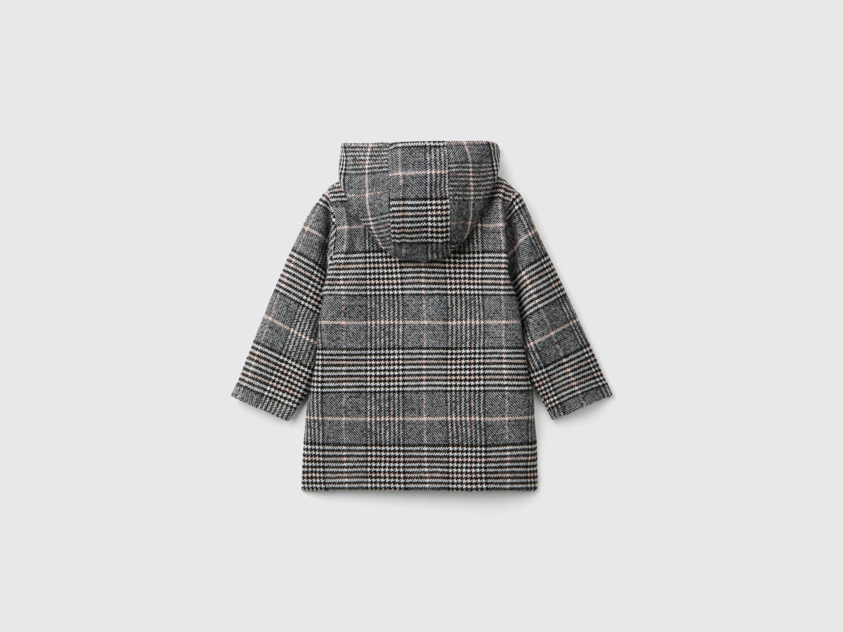 Giacca in tweed con cappuccio