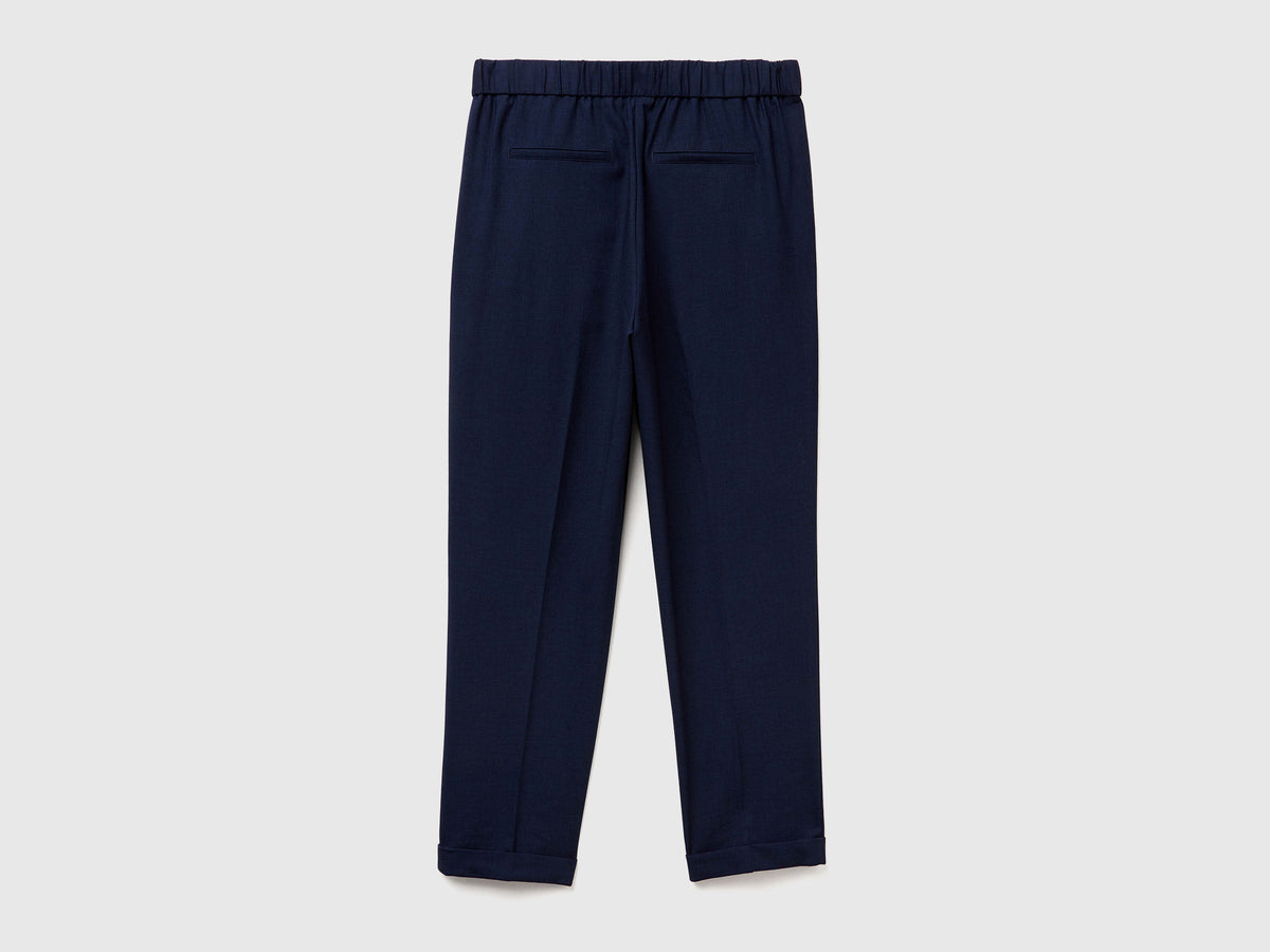 Pantaloni con risvolto in misto viscosa stretch