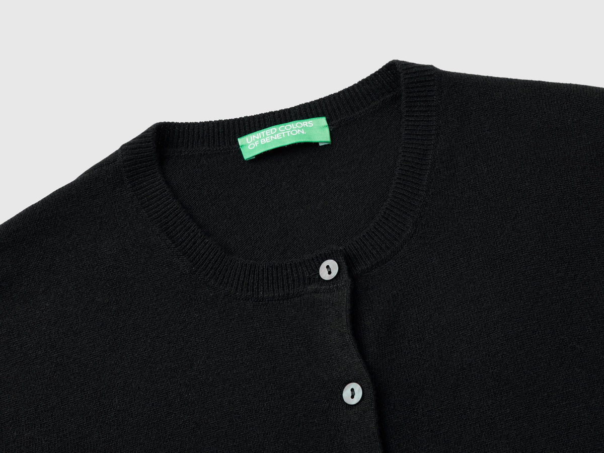 Cardigan girocollo nero in pura lana Merino