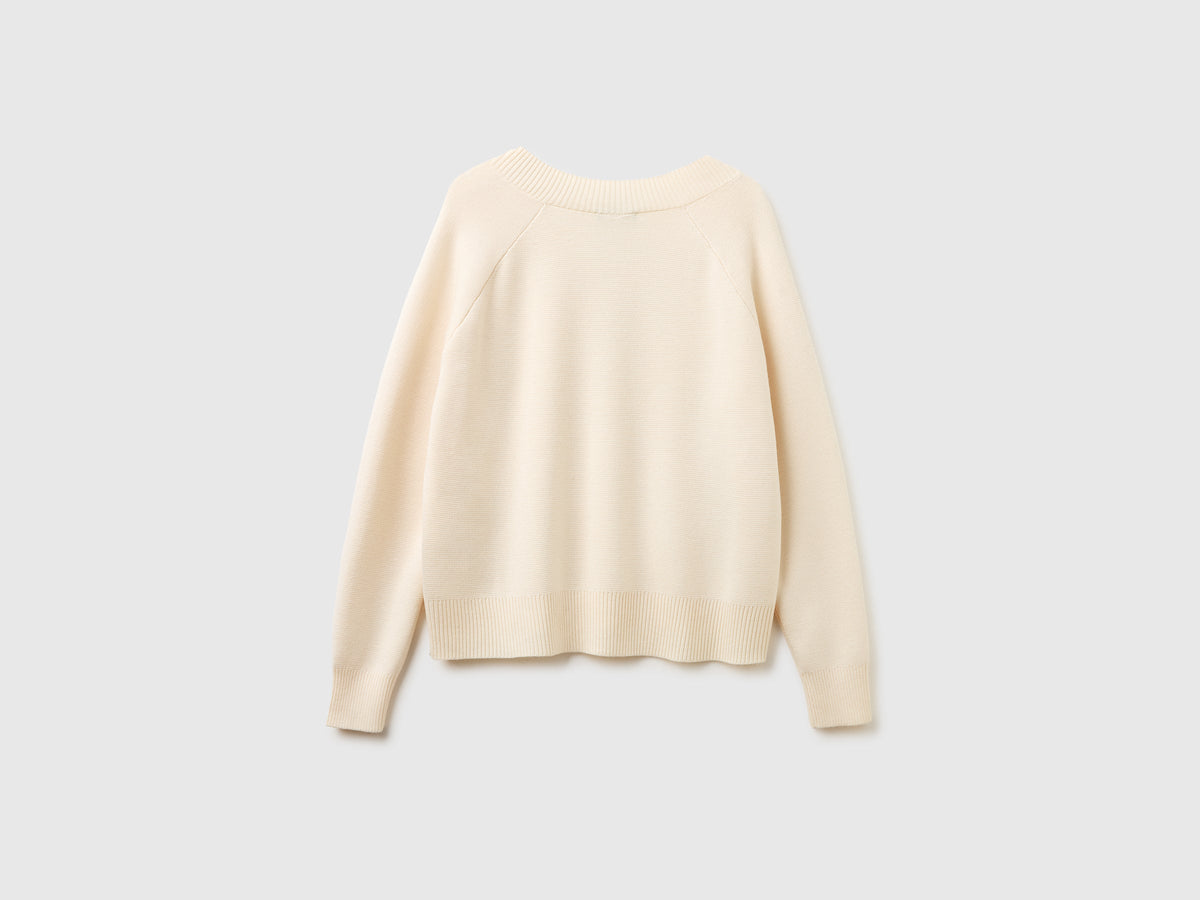Maglia lavorata scollo a V