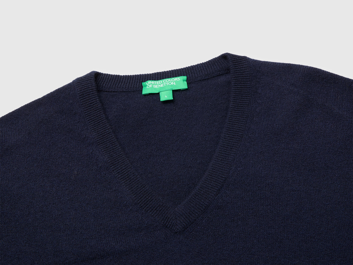 Maglia scollo a V blu notte in pura lana Merino