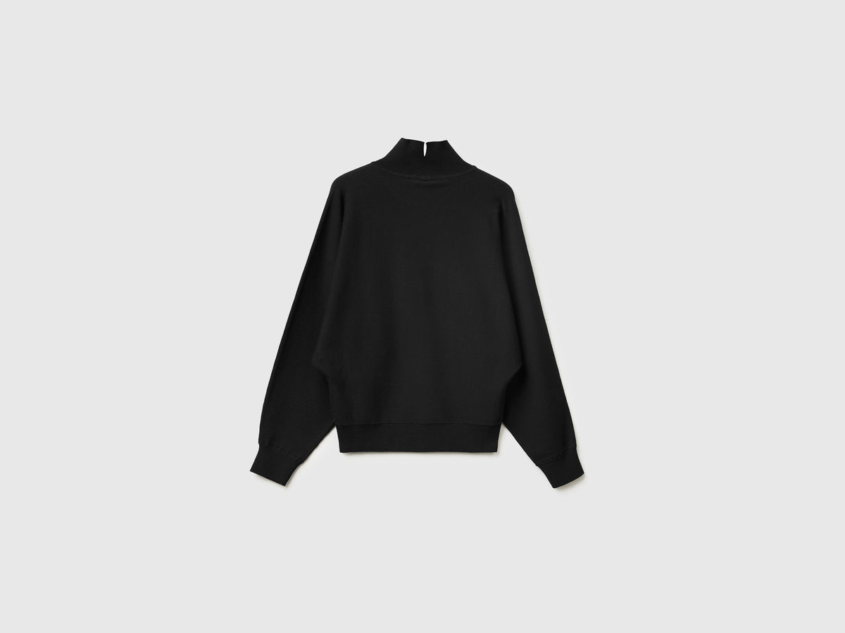 Maglia collo alto con manica a pipistrello
