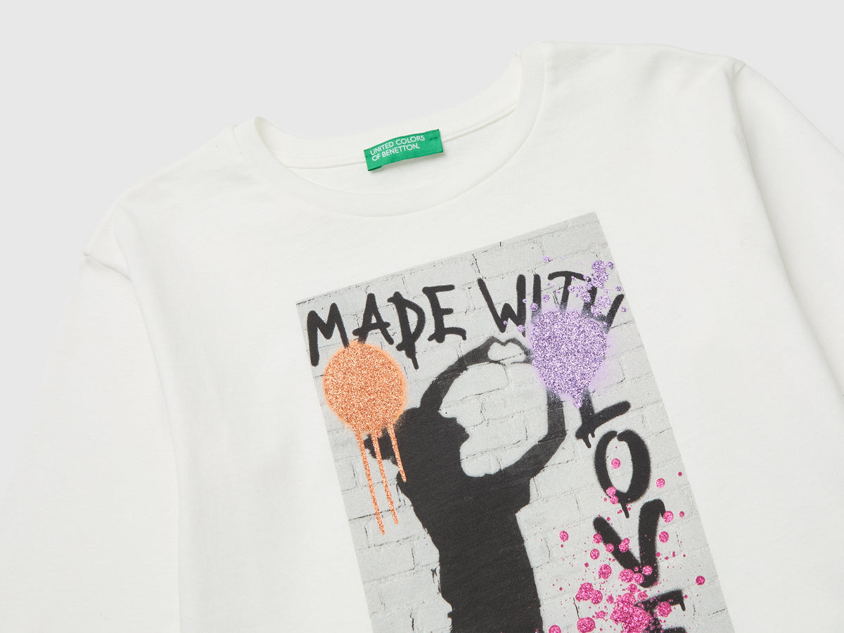 T-shirt con stampa fotografica e glitter