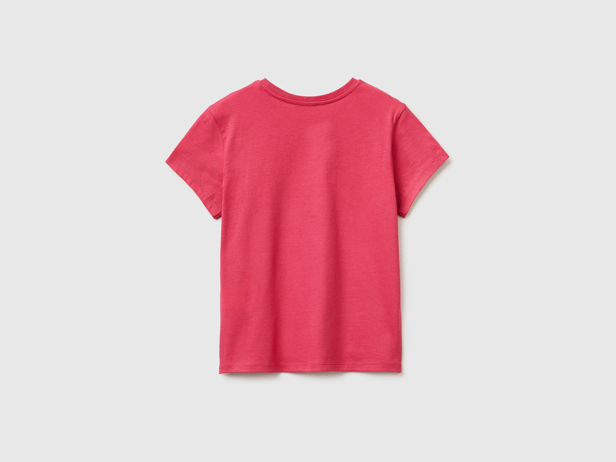 T-shirt con stampa glitter