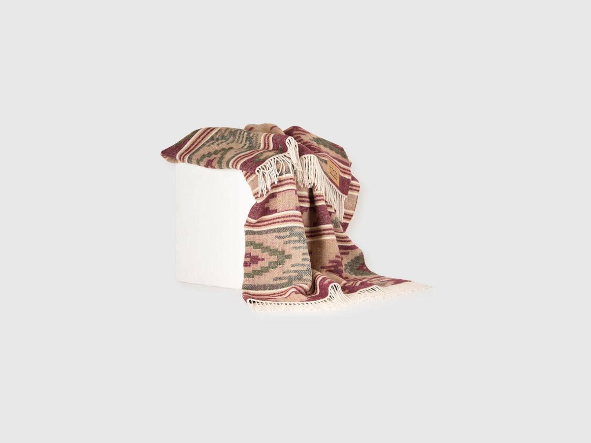 Coperta jacquard con frange