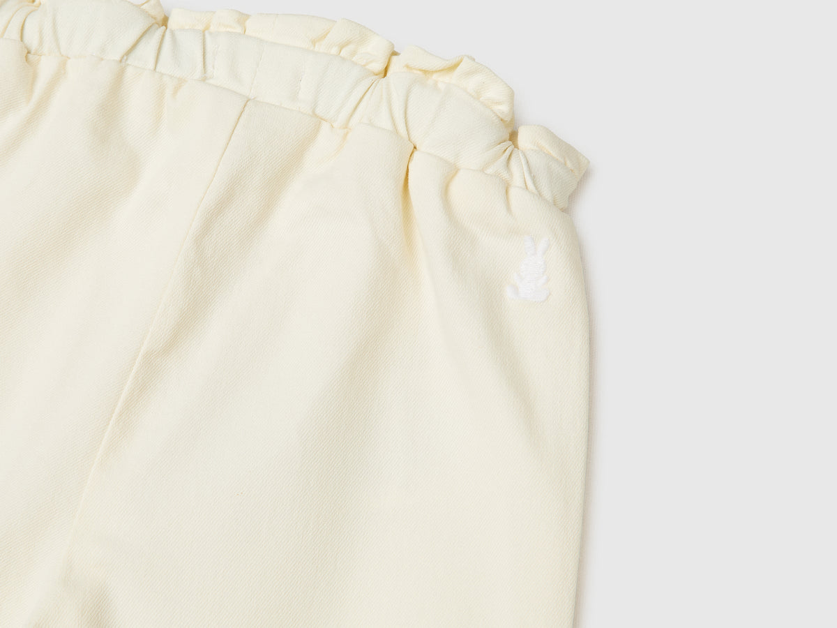 Pantaloni con mini rouches