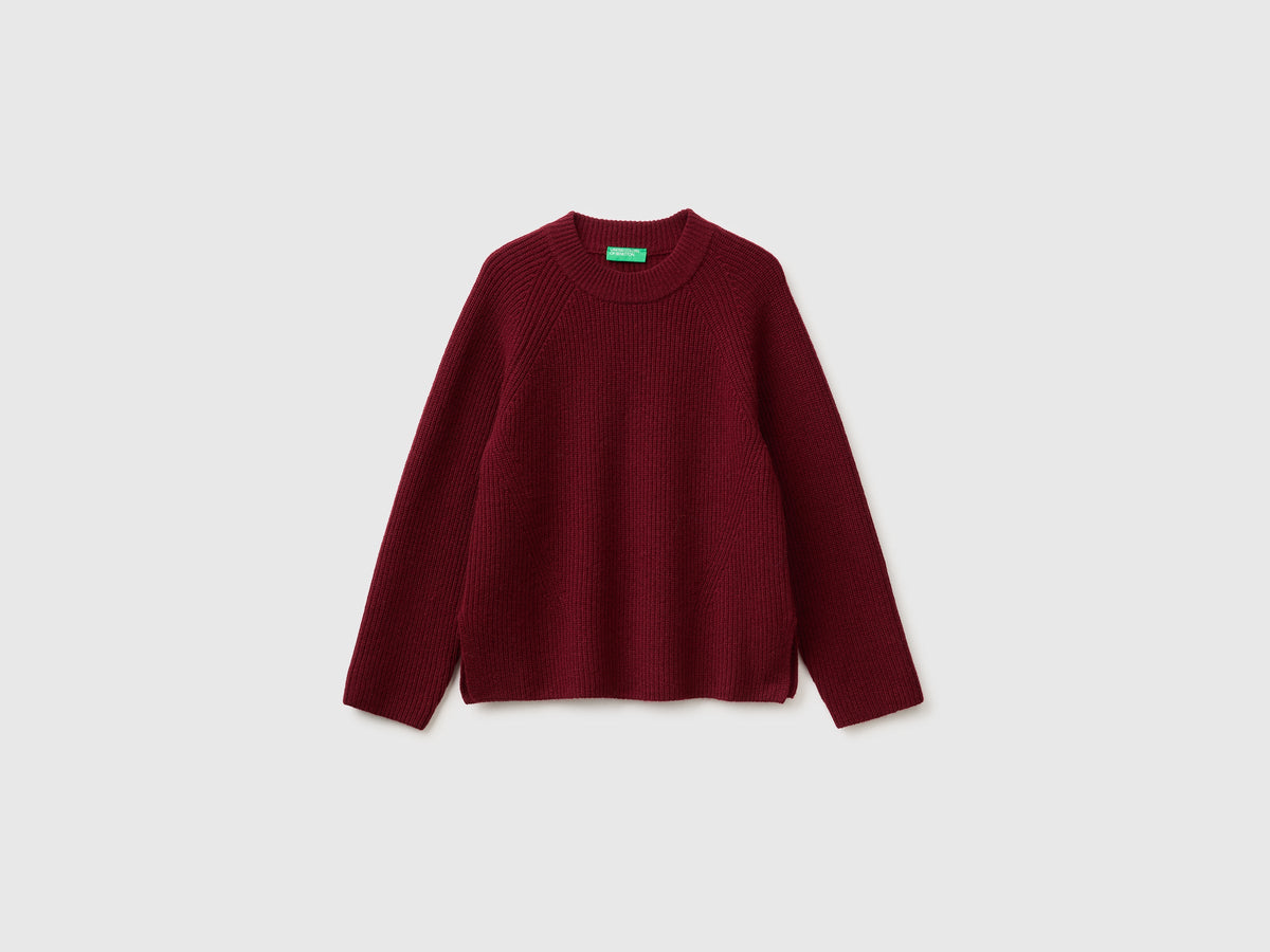 Maglia 100% lana con spacchetti sui fianchi