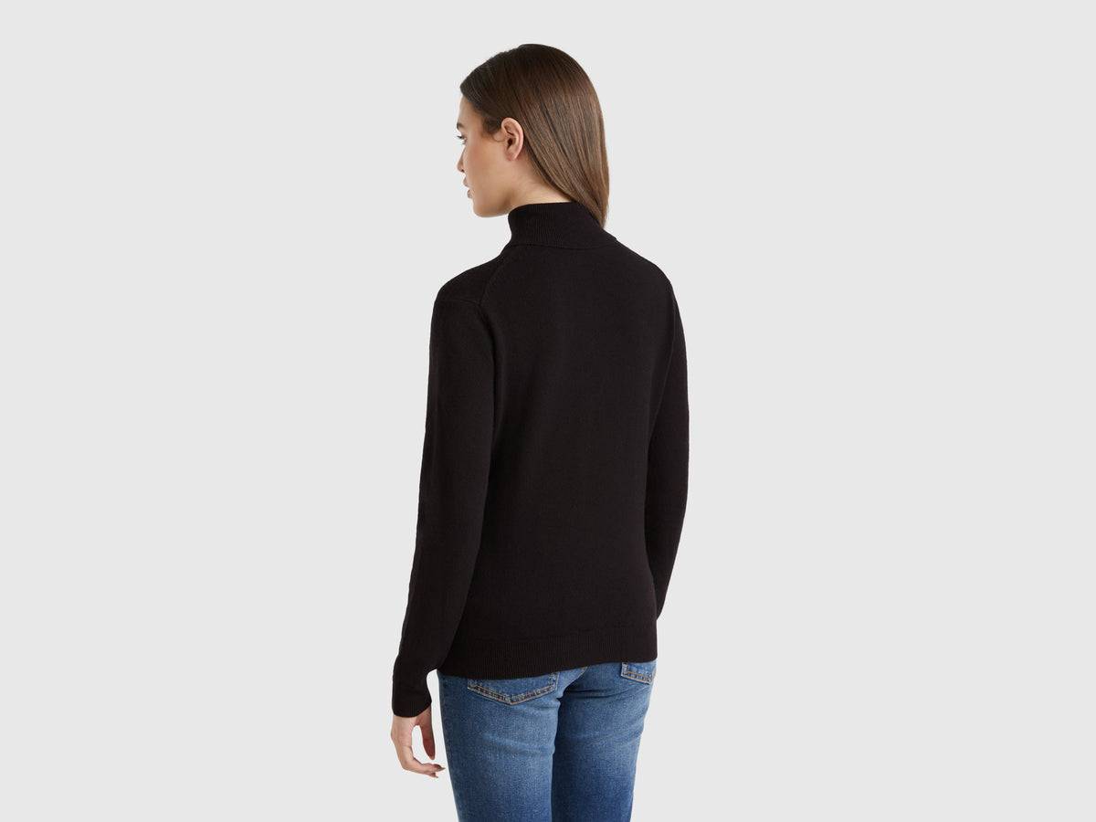 Maglione dolcevita nero in pura lana Merino