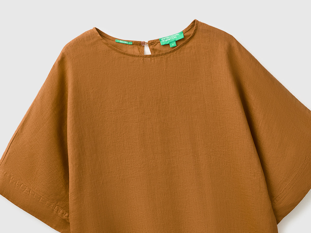Blusa girocollo in puro lino