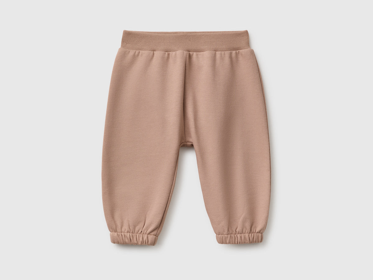 Pantaloni in felpa con animaletto sul retro