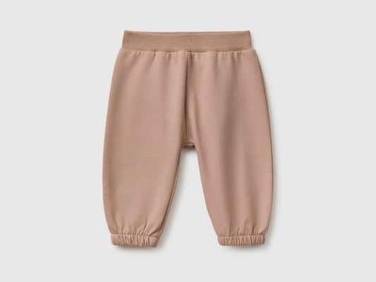 Pantaloni in felpa con animaletto sul retro