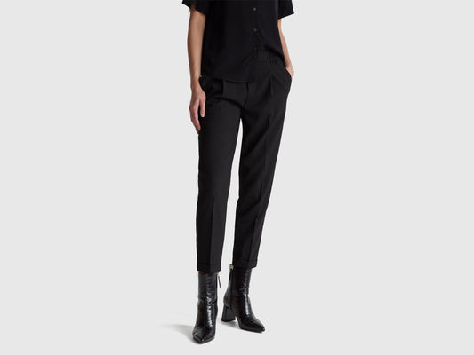 Pantaloni con risvolto in misto viscosa stretch