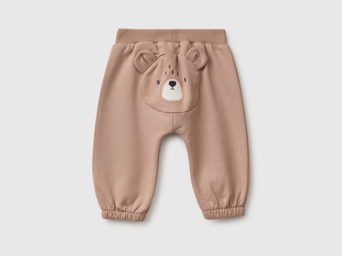 Pantaloni in felpa con animaletto sul retro