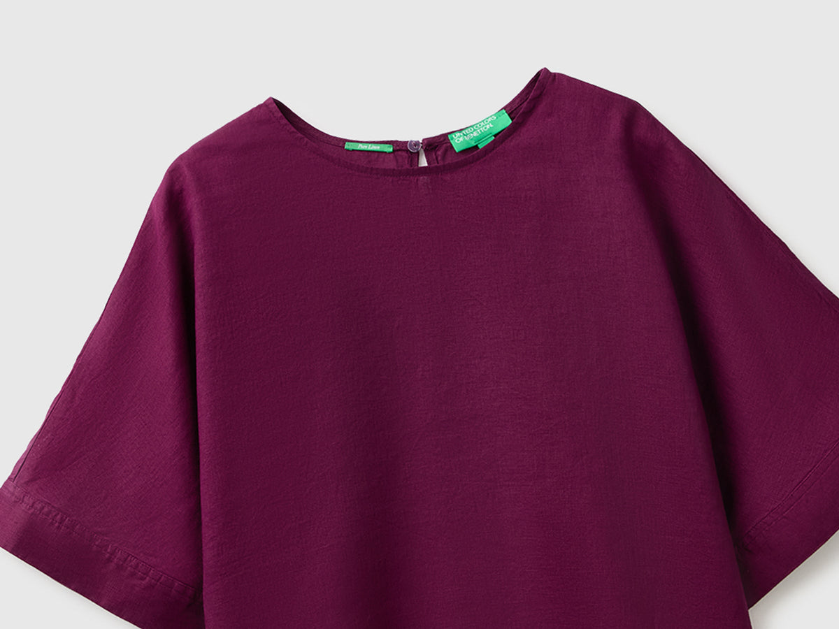 Blusa girocollo in puro lino