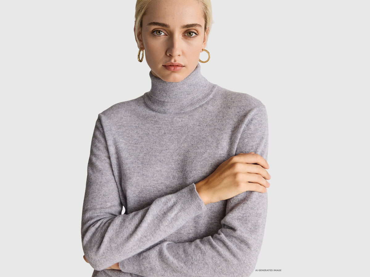 Maglione dolcevita grigio mélange in pura lana Merino