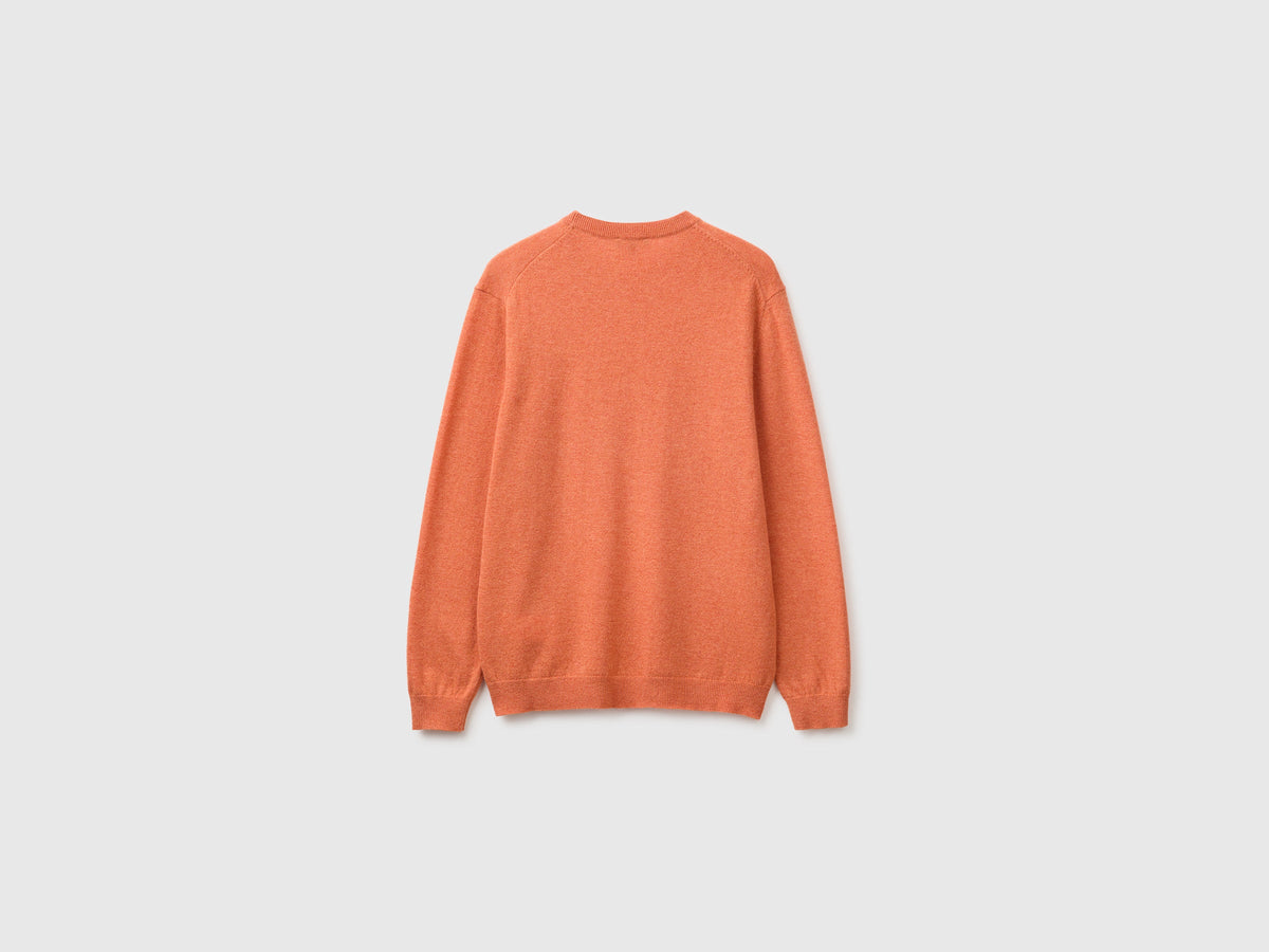 Maglia arancione in pura lana Merino
