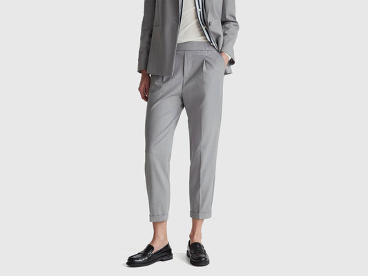 Pantaloni con risvolto in misto viscosa stretch