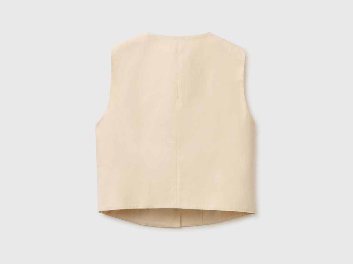 Gilet girocollo con bottoni