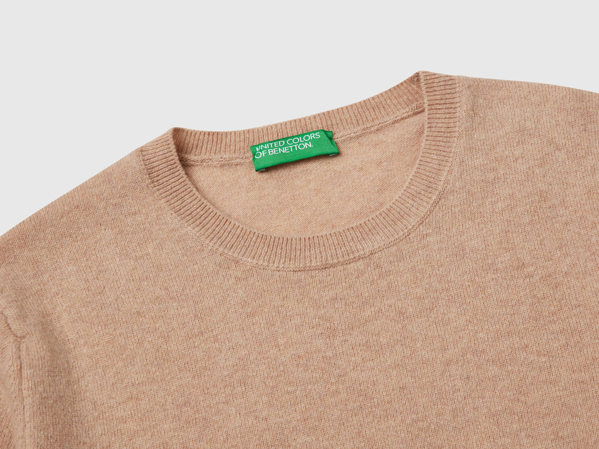 Maglia girocollo beige in pura lana Merino