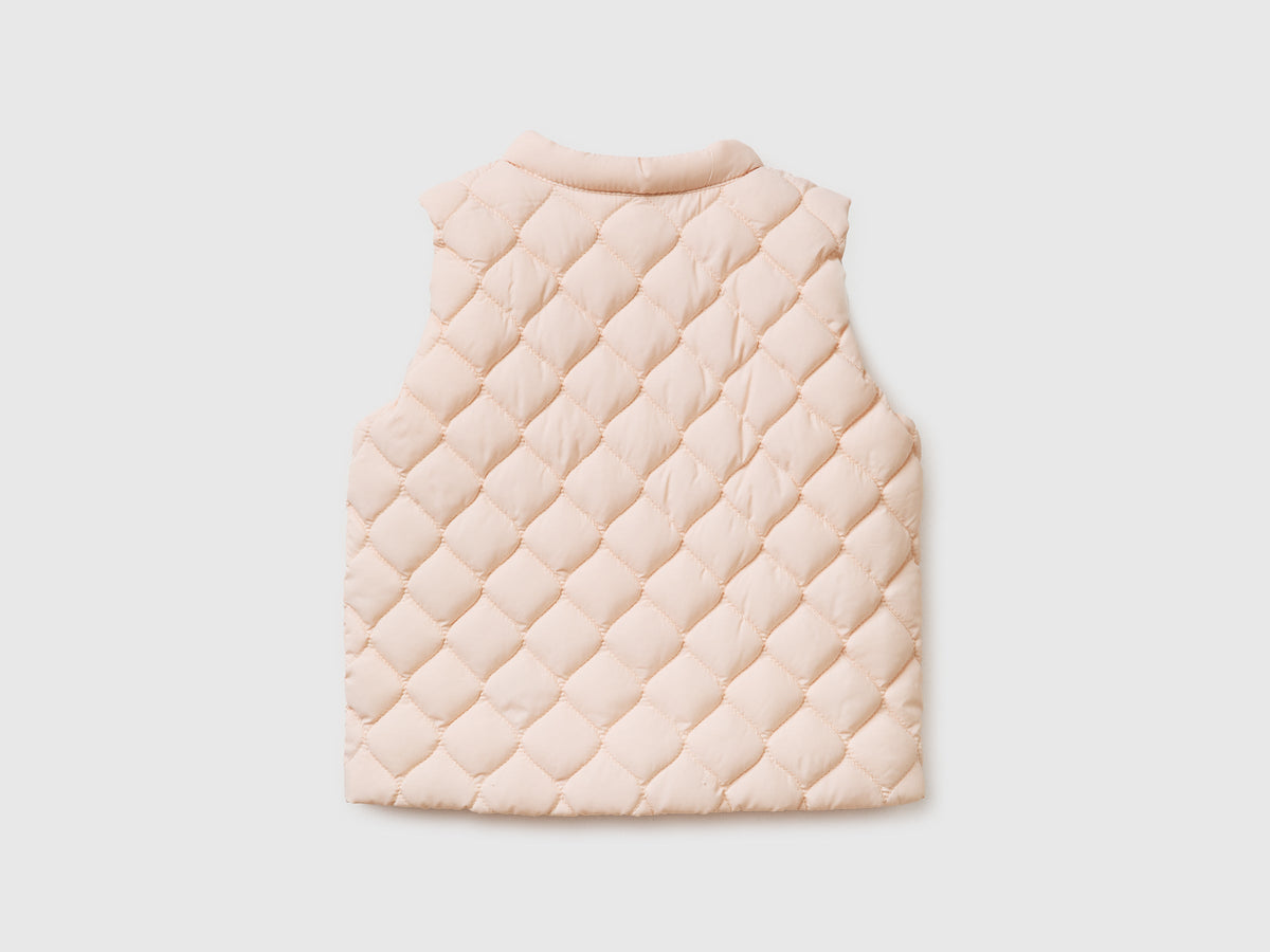 Piumino smanicato con zip