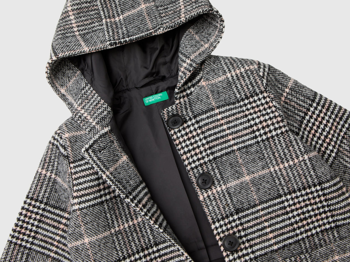 Giacca in tweed con cappuccio