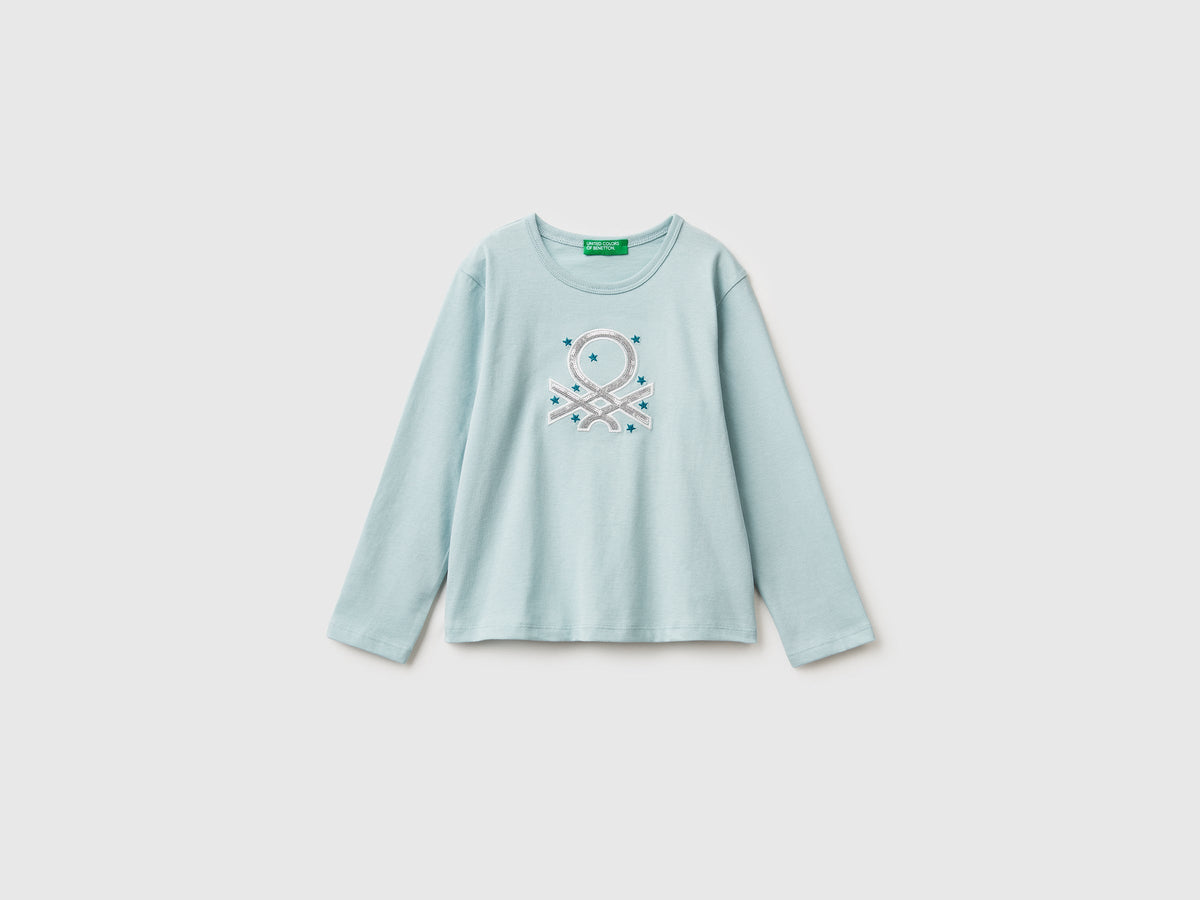 T-shirt con stampa e paillettes