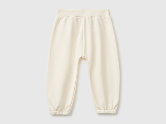 Pantaloni in felpa con animaletto sul retro