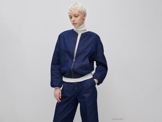 Bomber in denim con lurex