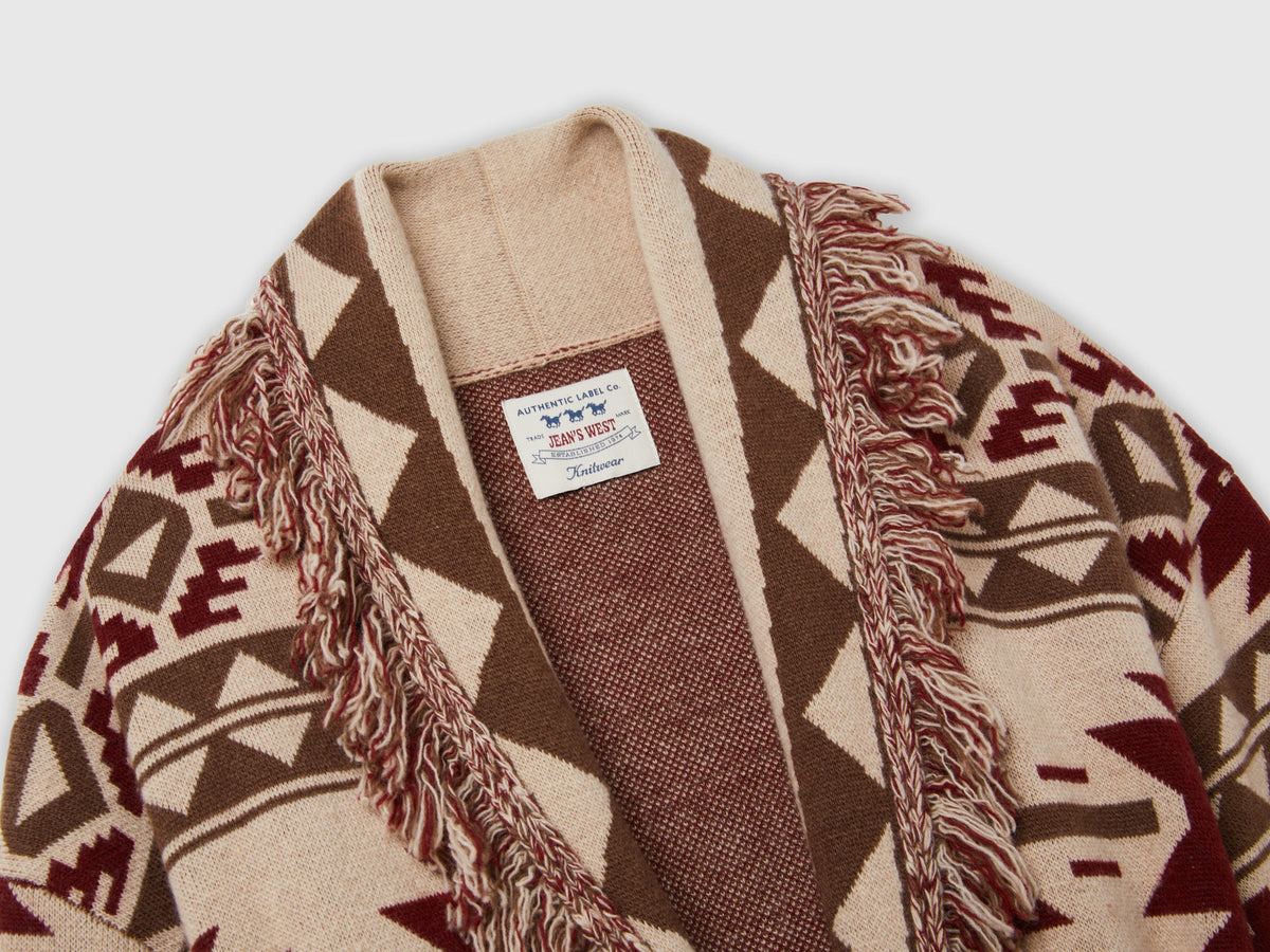 Giacca in maglia jacquard con frange
