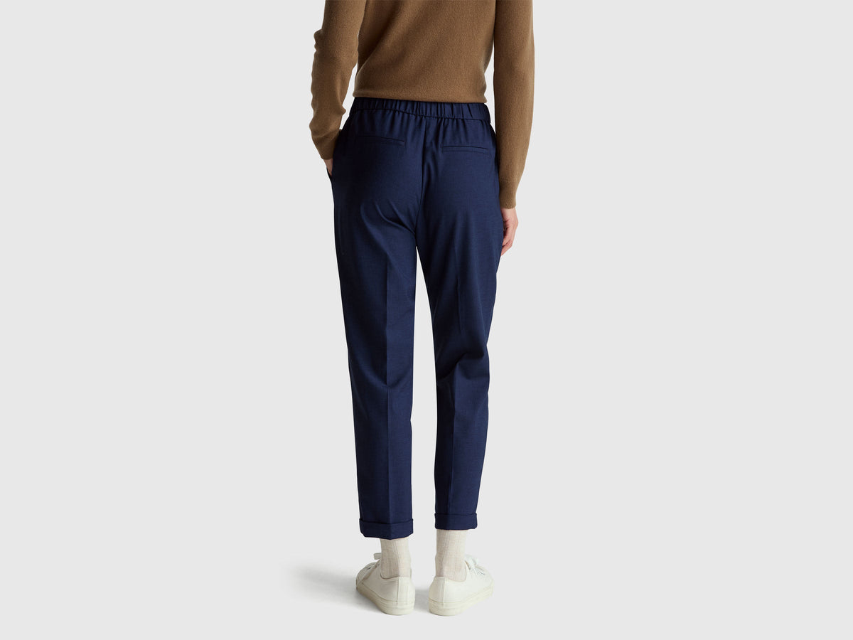 Pantaloni con risvolto in misto viscosa stretch