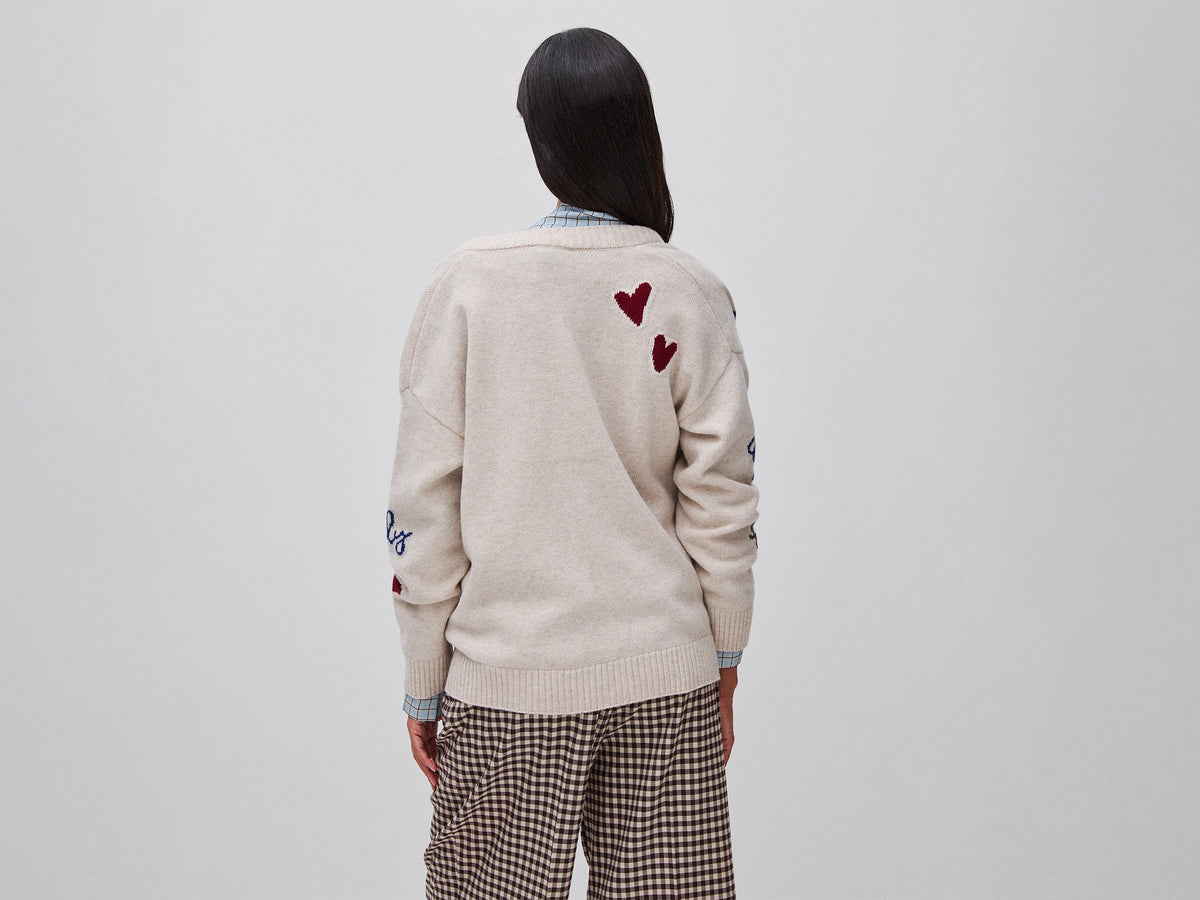Cardigan 100% lana con intarsio floreale