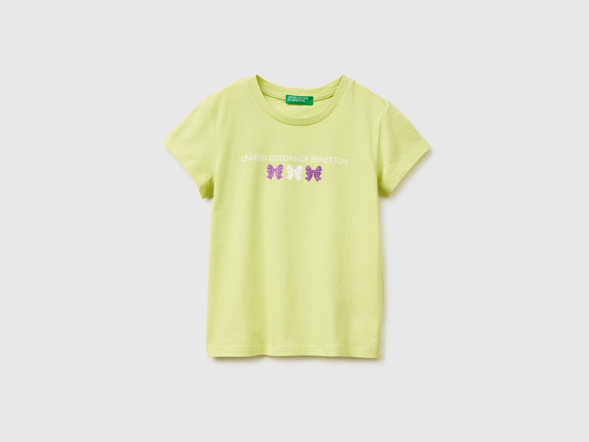 T-shirt con stampa glitter