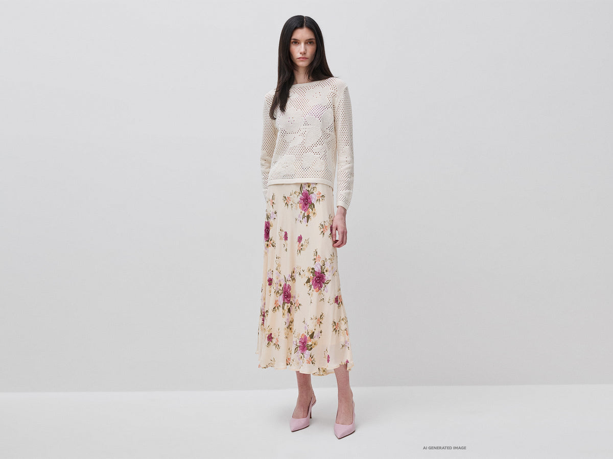 Maglia traforata con fiori