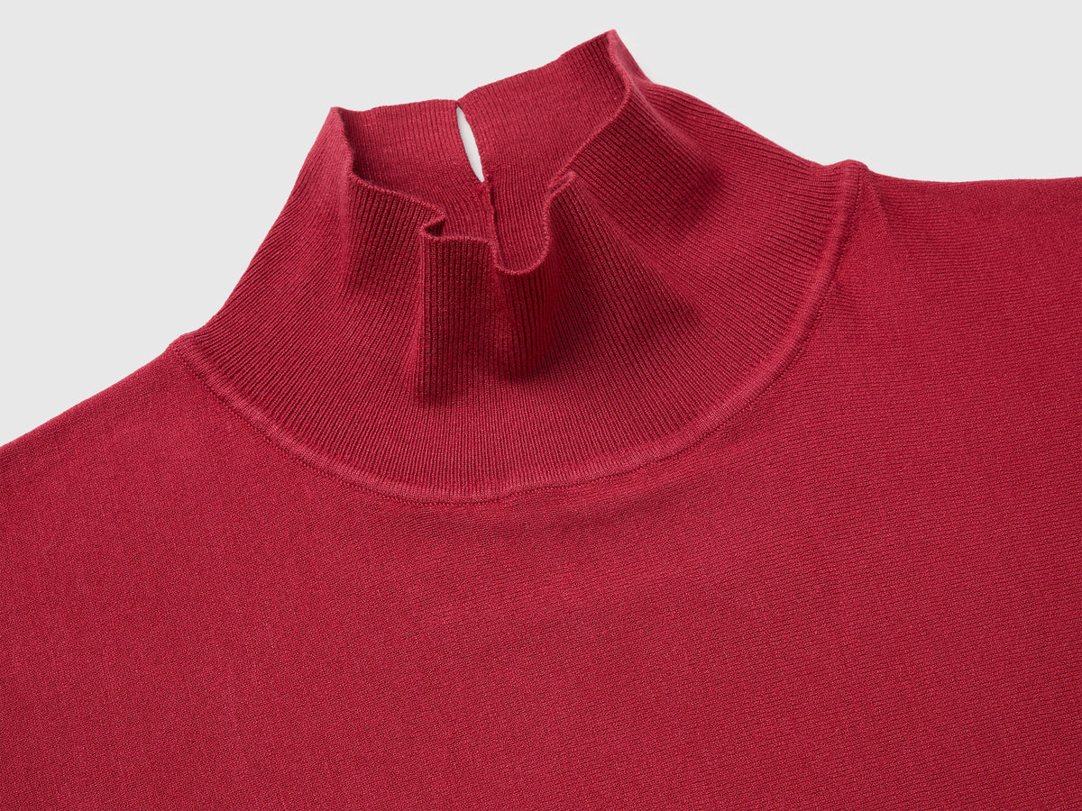 Maglia collo alto con manica a pipistrello