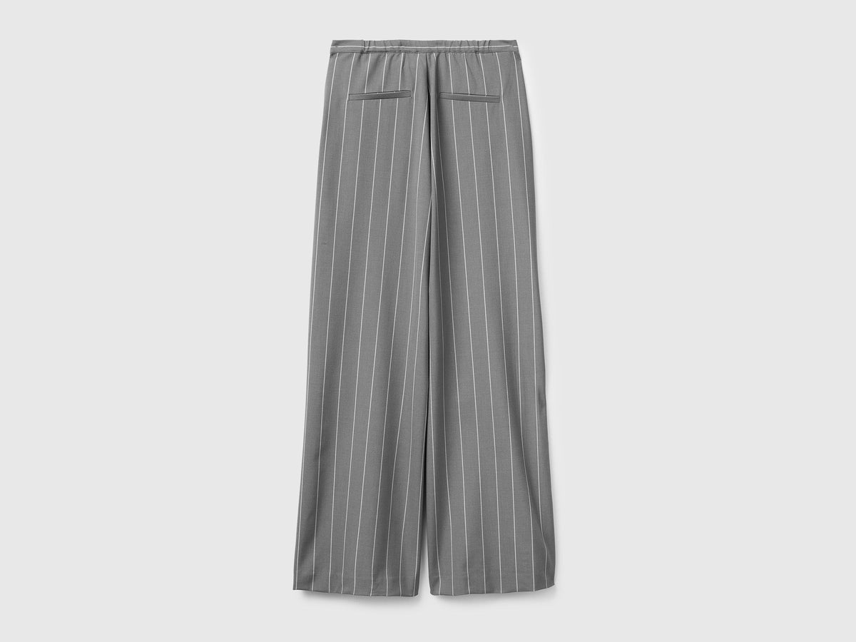 Pantaloni gessati gamba larga
