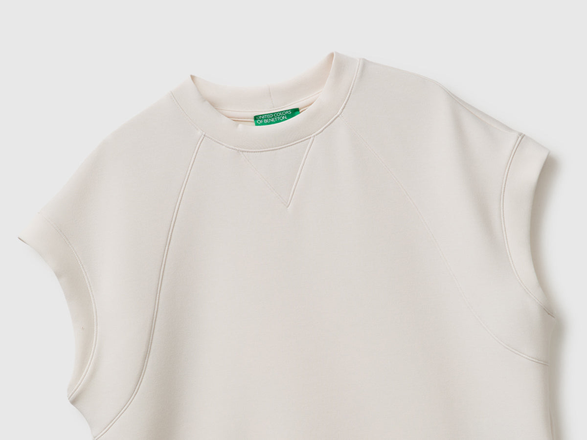 Top fluido con spacchi